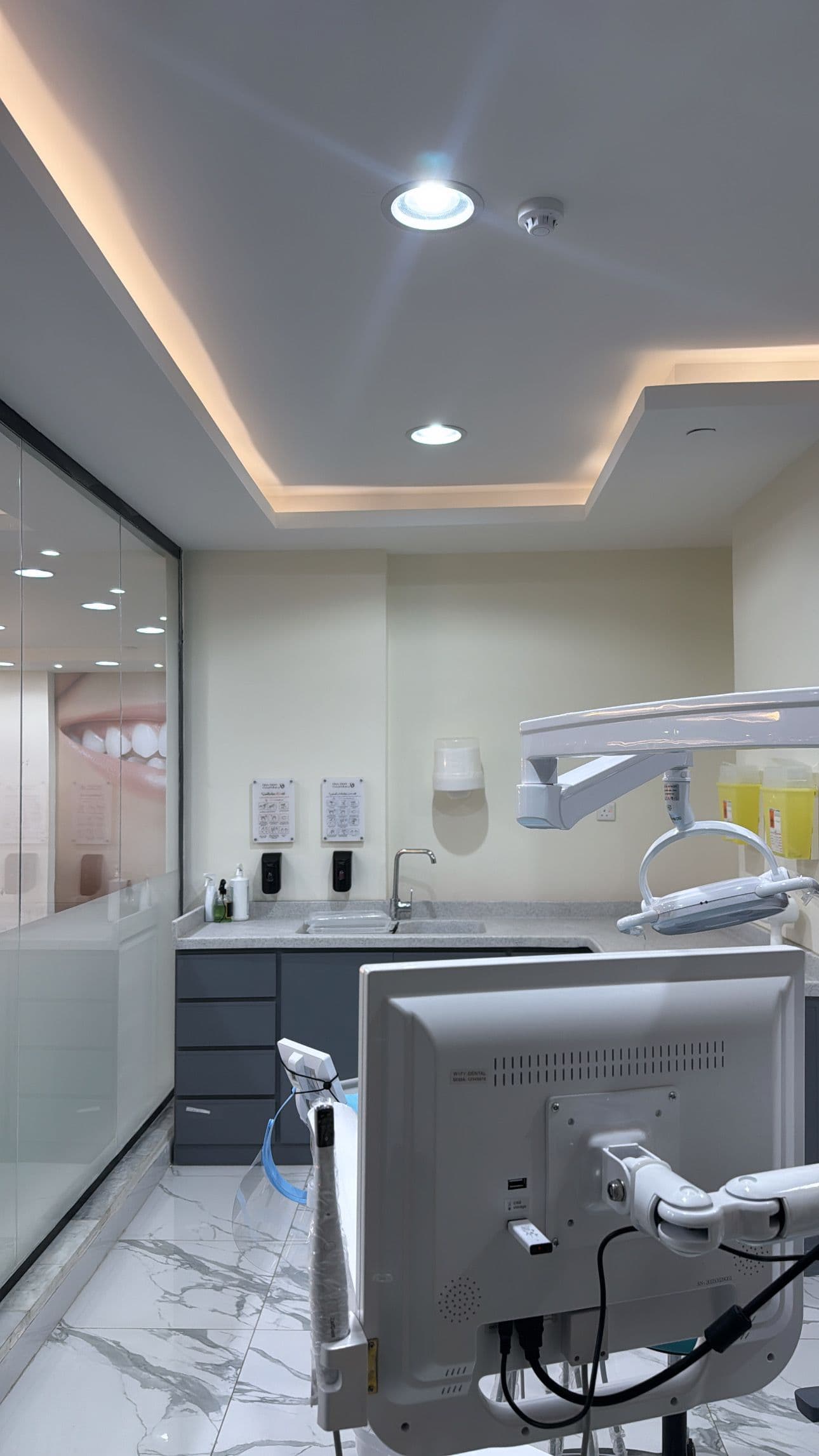 Dental workstation with modern chair and overhead light Denta at Diva
