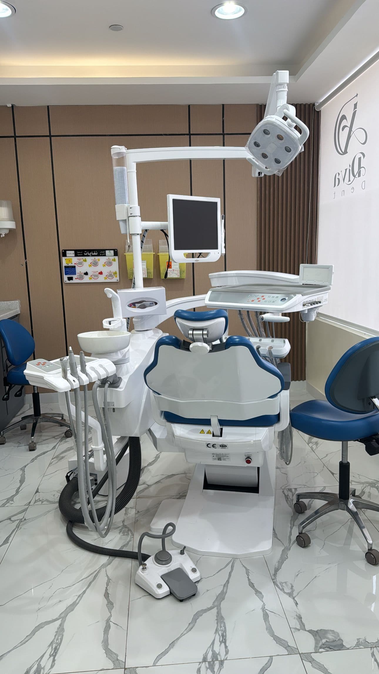 Dental workstation with modern chair and overhead light Denta at Diva